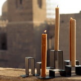 Close-up of stainless steel candleholders