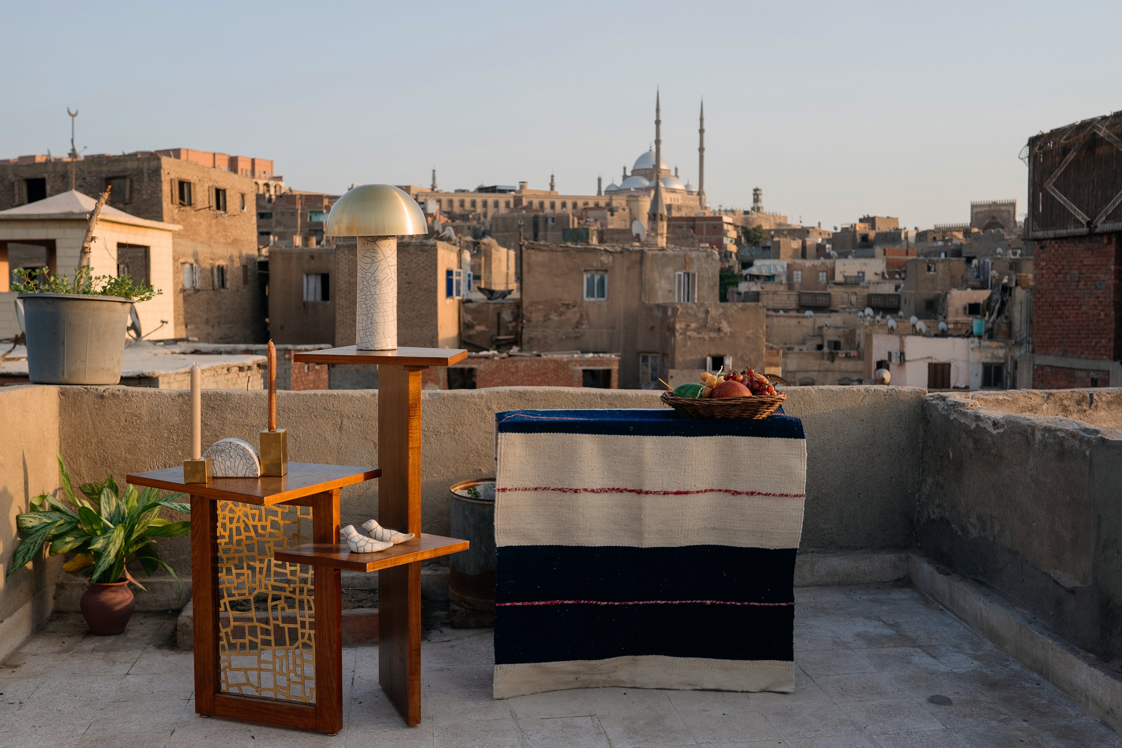 Corner wooden table with three tiers featured in a photoshoot in Egypt