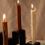 Close-up of the stainless steel candleholders 