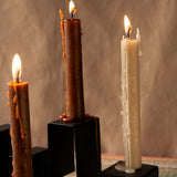 Close-up of the stainless steel candleholders 