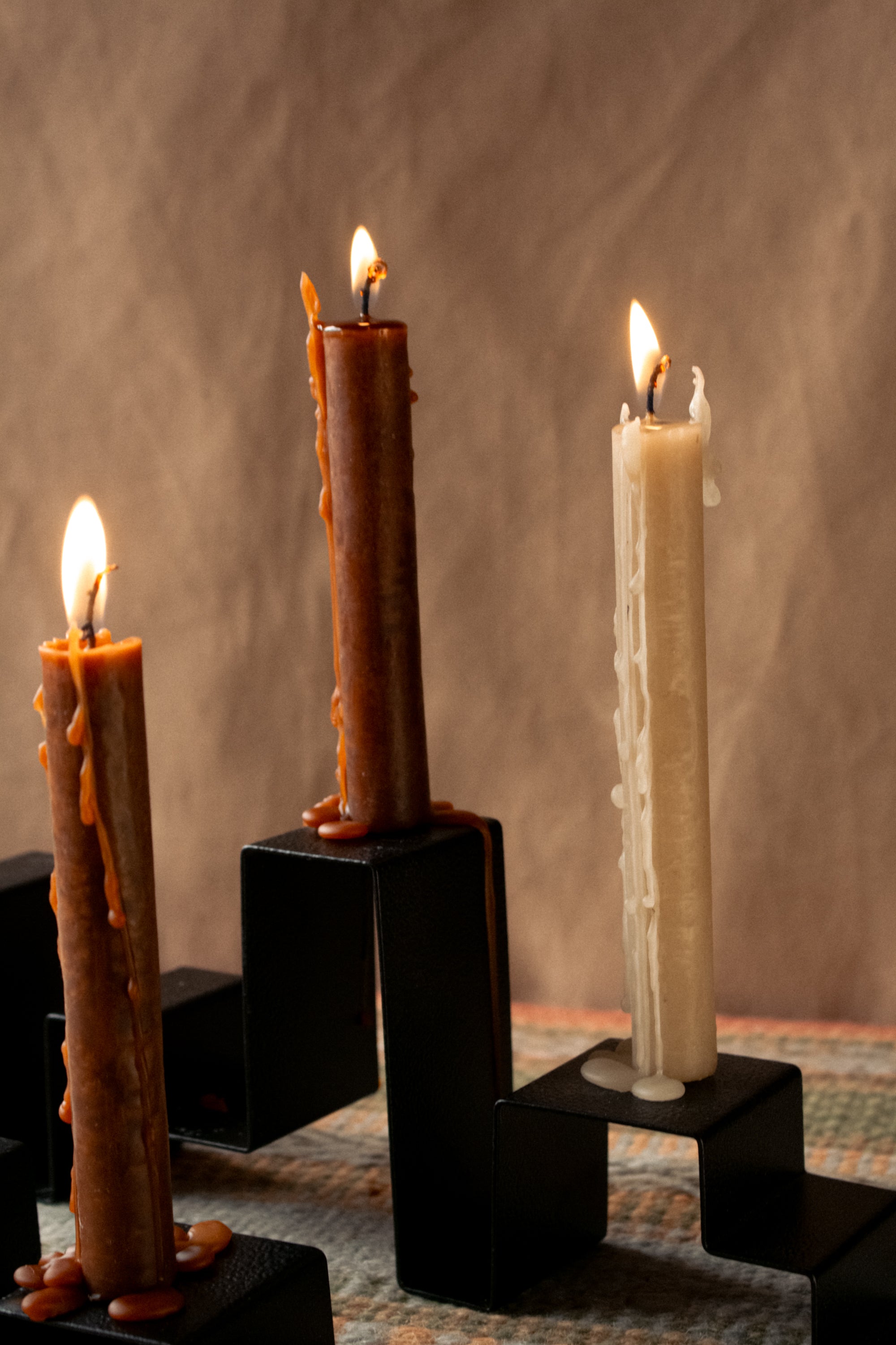 Close-up of the stainless steel candleholders 