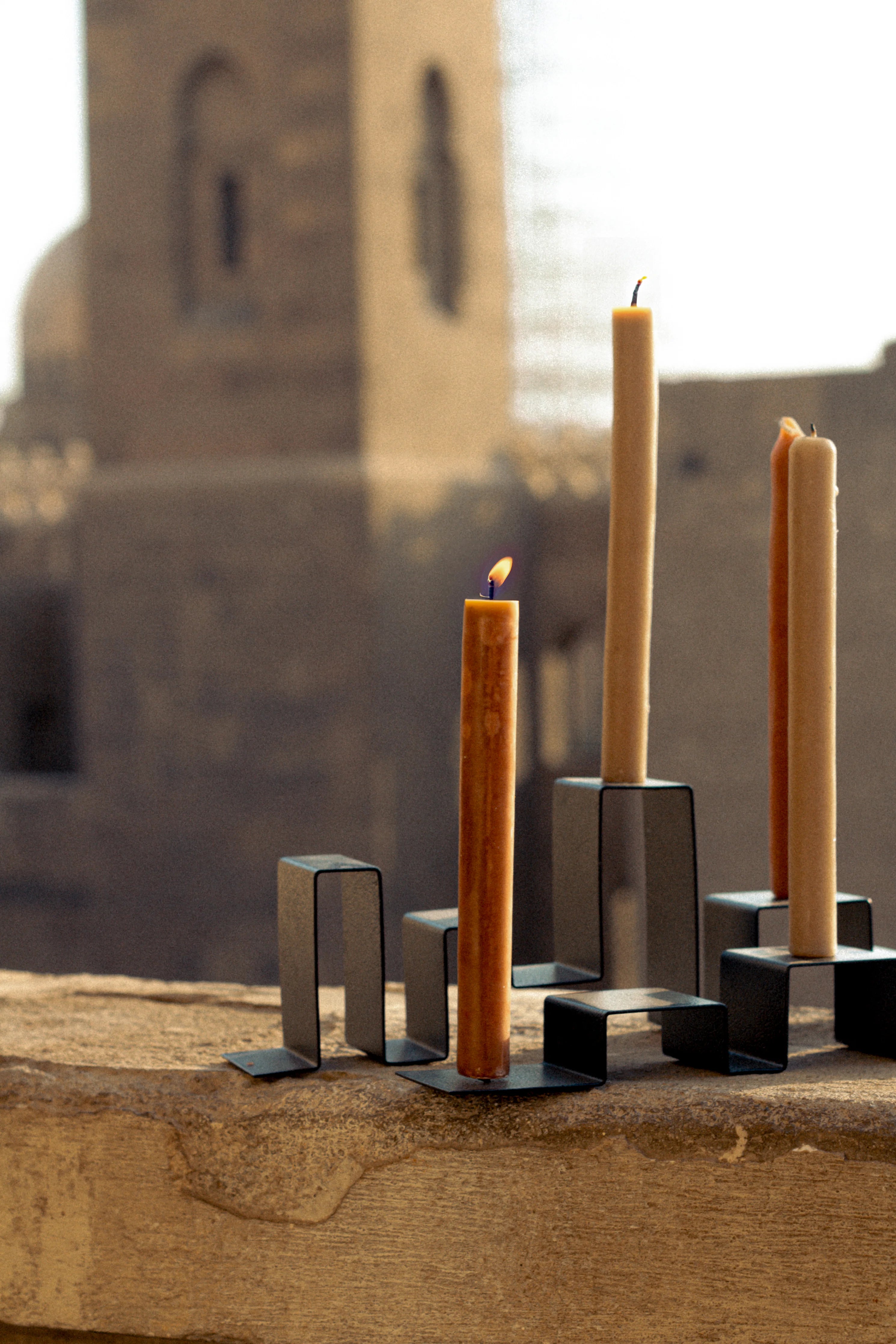 Close-up of stainless steel candleholders 